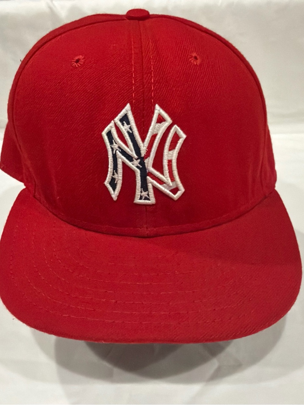 MLB Red New York Yankees Hat with White-Outlined NY Logo 7 5/8